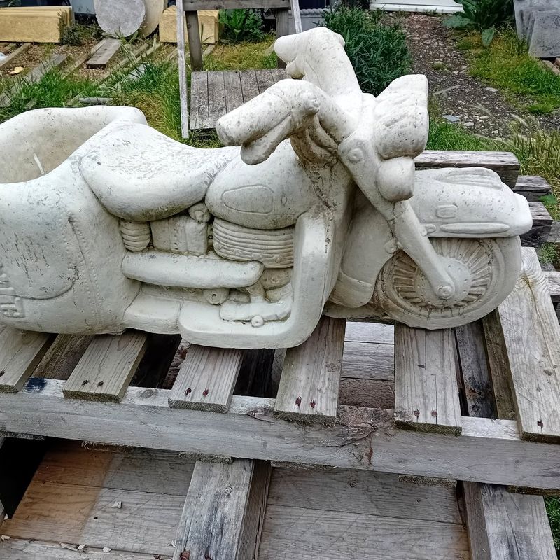 Motorbike and sidecar planter in natural pale concrete, seen from the side